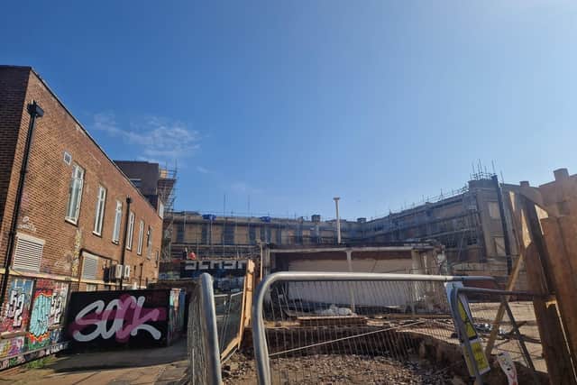 The front portion of the building is currently being covered with scaffolding which will be in place for an estimated six months. Meanwhile, the part of the site behind the street-facing facade has been demolished ahead of the construction of residential properties.