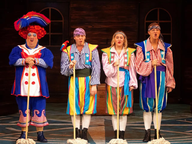 Jack Edwards as Mrs Smee with the ship's crew
Picture by Alan Bound for The Kings Theatre