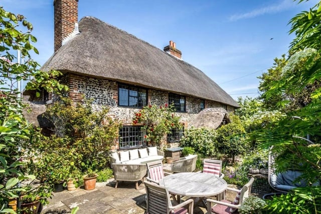 This property comes with four bedrooms, four reception rooms and two bathrooms.