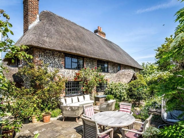 This property comes with four bedrooms, four reception rooms and two bathrooms.