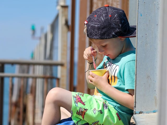 Greyson Perren-Barnes (four) enjoying a nice ice cream in the sun. Picture: Alex Shute