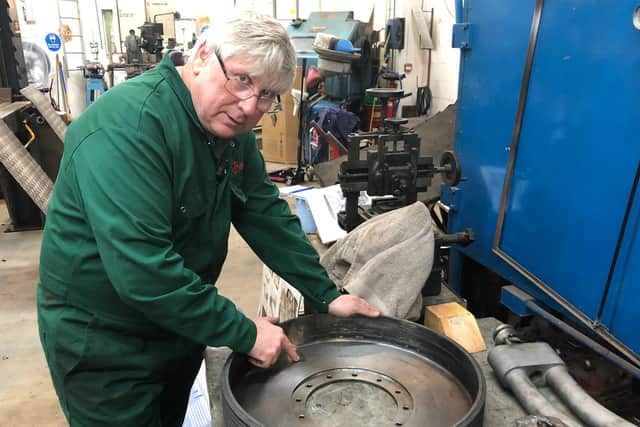 Senior Engineer Ian Stanfield shows crack in rear brake drum