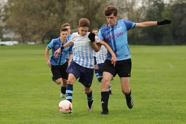 King George Rovers (black shorts) in action during their 13-0 Adelaide Cup loss to AFC Eastney Reserves. Picture: Kevin Shipp