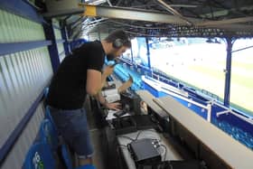 Jack from Lizard Events installing the equipment at Fratton Park