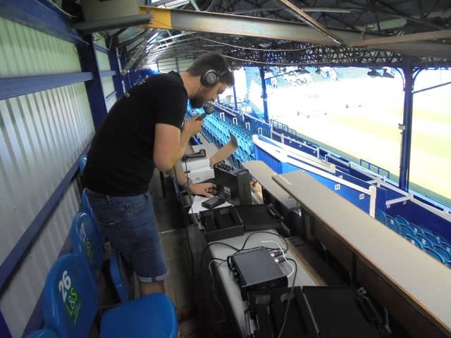 Jack from Lizard Events installing the equipment at Fratton Park