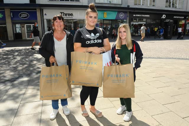Shops across the country reopened their doors on Monday, June 15, including Cascades Shopping Centre and Commercial Road in Portsmouth.
Pictured is: (l-r) Audrey Brown (51) with her daughter Kieara Brown (19) from Havant and their friend Maisie Landers (13) from Cosham. They were third in the Primark queue and had been queueing since 6.30am.
Picture: Sarah Standing (150620-9951)