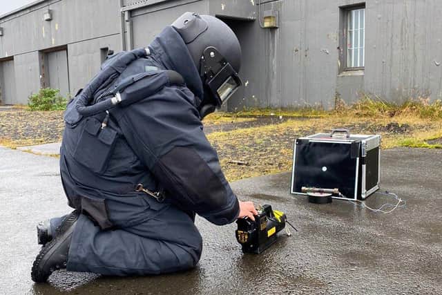 An EOD operator uses X-ray equipment to help make a full assessment of the device after neutralising it remotely. Photo: Royal Navy