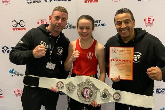 Holly Heffron (centre) and Heart of Portsmouth Academy head coach Q Shillingford MBE