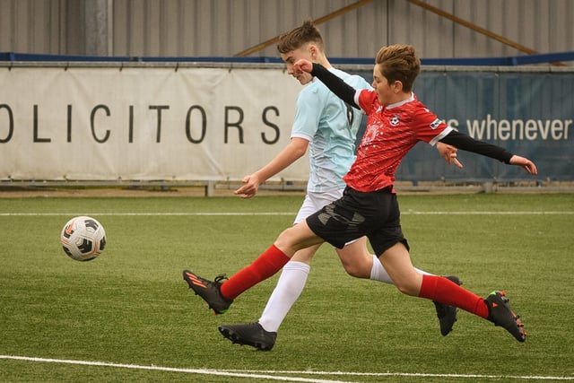 Action from the Portsmouth Youth League Geldard Invitation Cup final between Jubilee 77 U13s and Castle United U13s (light blue and white kit). Picture: Keith Woodland (190321-922)