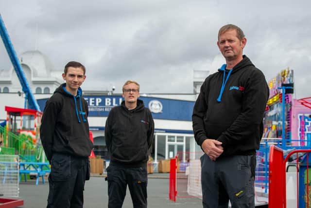 Andy Kircher runs a CCTV business and he has grown over the past year, employing two young apprentices

Pictured: Andy Kircher with his apprentices, Alfie Newsham and Luke Mitchell at South Parade Pier, Southsea on 20 August 2021

Picture: Habibur Rahman