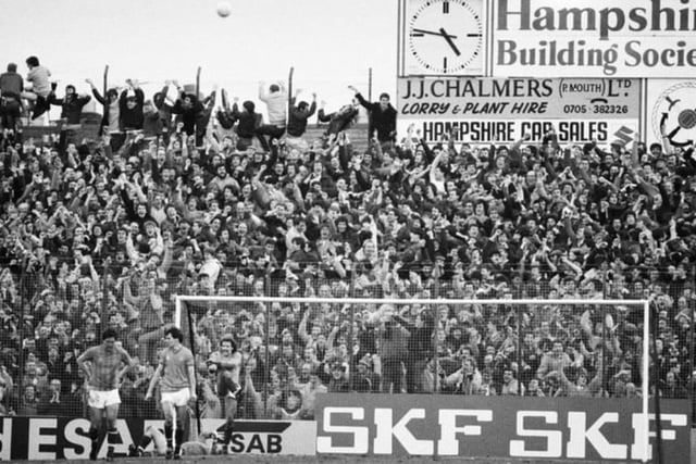 Fans in the terraces watching a Portsmouth v Southampton match at Fratton Park, Portsmouth, UK, 30th January 1984. (Photo by Reg Lancaster/Daily Express/Hulton Archive/Getty Images)