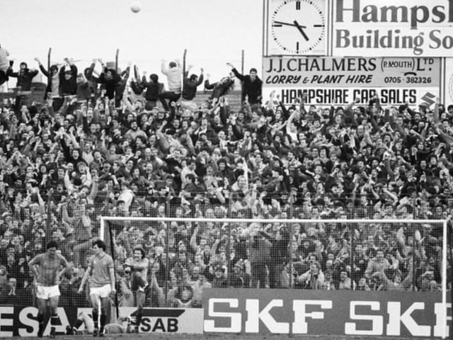 Fans in the terraces watching a Portsmouth v Southampton match at Fratton Park, Portsmouth, UK, 30th January 1984. (Photo by Reg Lancaster/Daily Express/Hulton Archive/Getty Images)