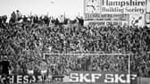Fans in the terraces watching a Portsmouth v Southampton match at Fratton Park, Portsmouth, UK, 30th January 1984. (Photo by Reg Lancaster/Daily Express/Hulton Archive/Getty Images)