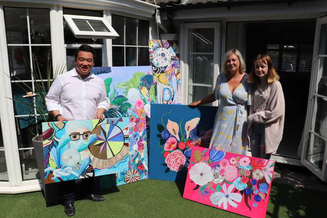 Alan Mak MP with artist Karina Vaile and her daughter Tilly at their home in Warblington 