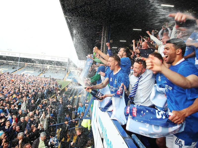 Pompey secured the League Two title with a thumping win over Cheltenham having topped the table for the final 32 minutes of the season. Paul Cook's men began the day in third, having already won promotion. They were reliant on top-two Doncaster and Plymouth both failing to win - which is exactly what unfolded. Picture: Joe Pepler