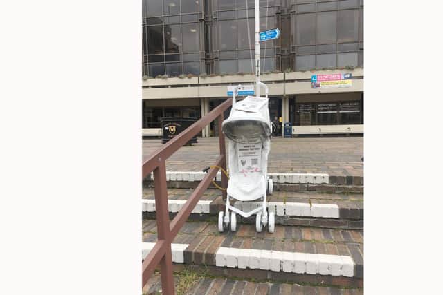 Members of extinction rebellion Southsea and CEE Bill Alliance Portsmouth put an art installation outside the civic offices on March 16.  The white painted pram represents the futures of those which will be lost due to climate change. It has a QR code inside which links to a letter people can sign and send to their MP.