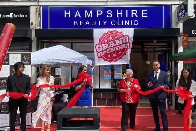 Mayor of Havant Cllr Rosy Raines (in red) at the opening of Hampshire Beauty Clinic in Leigh Park with Leona, Lee Ong, Lan Ong, Evie, and Benji