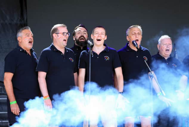 The Solent Gay Mens Community Chorus at Portsmouth Pride, Southsea Common. Picture: Chris Moorhouse (jpns 110622-14)