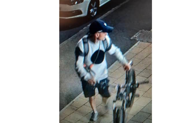Police have released CCTV footage of a suspect after a vehicle in Southsea was ransacked last month.
