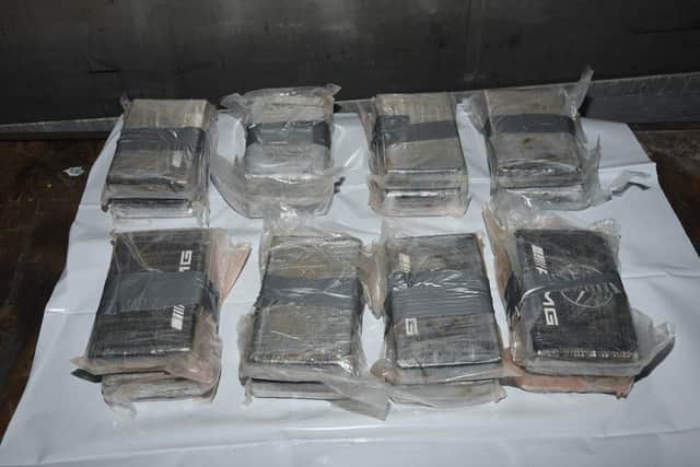 The packages of cocaine taken out of the refrigeration unit, hidden behind the limes