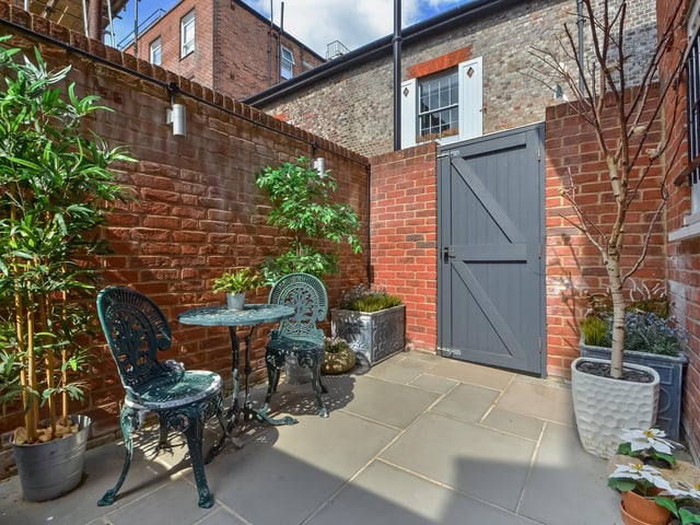 This townhouse has roof top terrace elevated views over the historic waterfront surroundings. Picture: Fine & Country