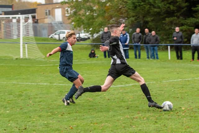 Hayling's George Rough, right, scored the only goal in the win against Clanfield. Picture: Vernon Nash