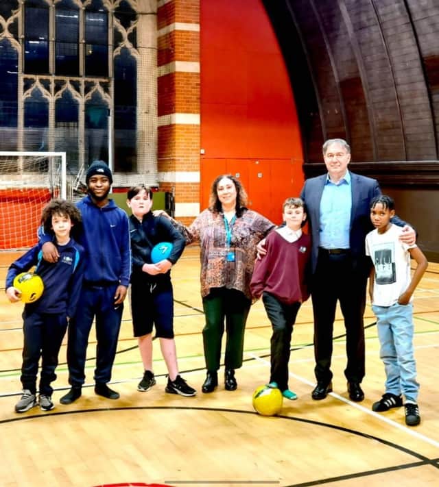 Dmitry Leus with six attendees of the Harrow Club