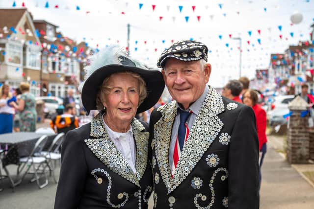 Pearly Queen Christine Chapman, 78, with husband Malcolm Chapman, 82, at the Selsey Avenue jubilee street party. Picture: Mike Cooter (040622)