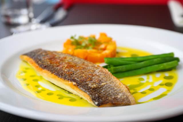 Yvonne and Andrew Cohen have opened a new restaurant in Southsea called Minnies. Sunset Sea Bass.Picture: Stuart Martin (220421-7042)