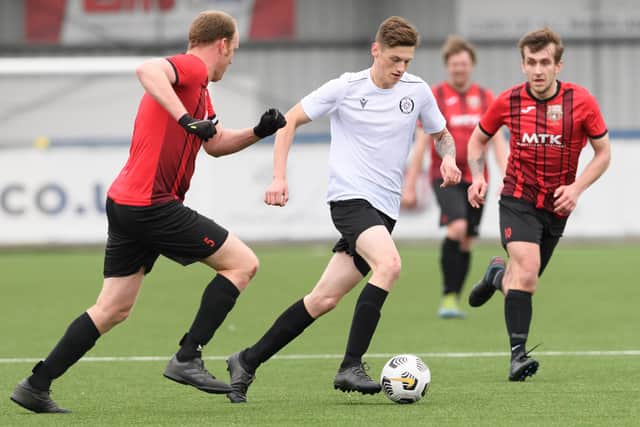 Horndean United (red/black) v East Lodge Youth. Picture: Keith Woodland