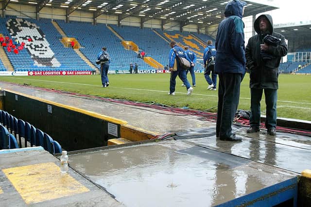 The waterlogged pitch at Fratton Park, Portsmouth as the game is called off following a pitch inspection before the Barclays Premiership match between Portsmouth and Arsenal, Saturday March 25, 2006. Picture:Chris Ison/ PA.
