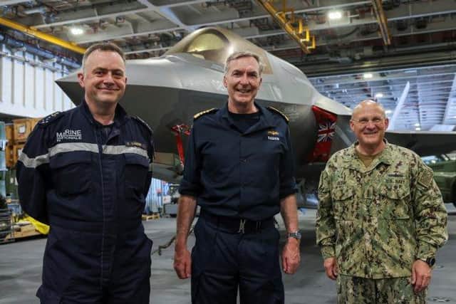 Pictured: Admiral Radakin, Admiral Vandier, and Admiral Gilday in front of an F35B.