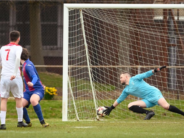 Horndean's Tommy Tierney scores his side's second goal. Picture: Keith Woodland