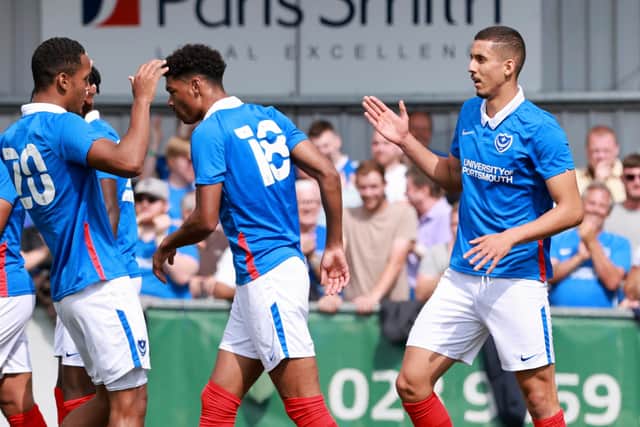 Gassan Ahadme, right, celebrates his third goal against the Hawks.  Picture: Paul Cooper