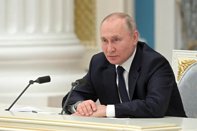 Russian President Vladimir Putin chairs a meeting of big businesses at the Kremlin in Moscow. Picture Alexey NIKOLSKY / SPUTNIK / AFP via Getty Images)