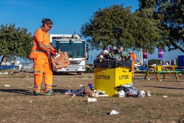 Clearing the Victorious festival site early on Monday morning. Picture: Mike Cooter (290822)