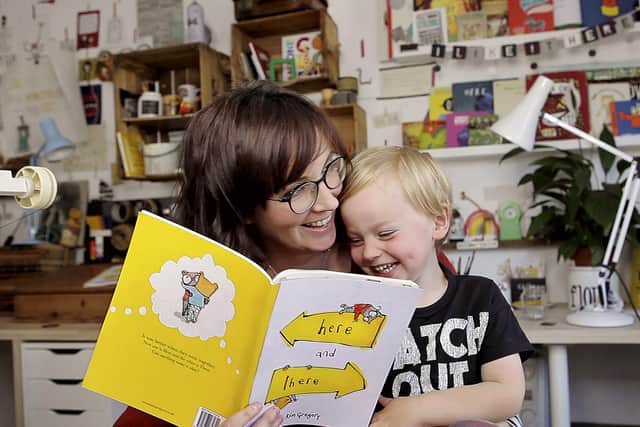 Kim Gregory from Cosham wrote and illustrated a lockdown-inspired children's book to help children with being apart from friends and family. Pictured: Kim and her son Edward, four