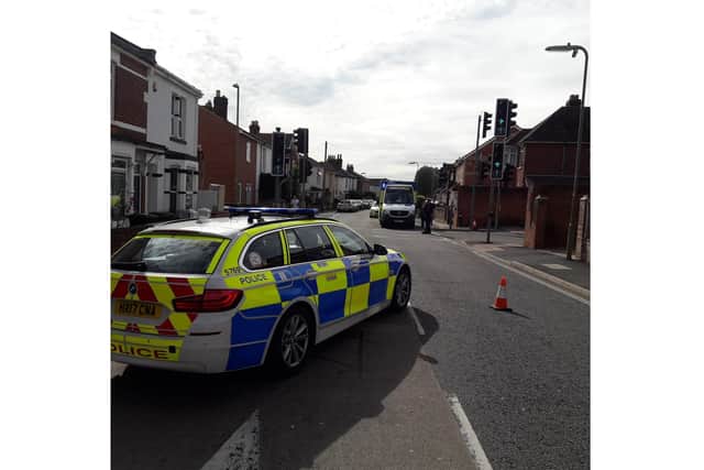 Police and emergency services at the scene in Grove Road following the crash. Photo: Hampshire Roads Policing Unit/Twitter