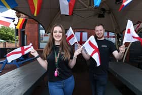 Supervisor Kara Horsburgh and general manager Lawrence Hall get behind England at The Shepherds Crook pub, Fratton, for Euro 2020
Picture: Chris Moorhouse (jpns 110621-45)
