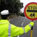 School crossing patrols could be put at risk as a result of measures by Hampshire County Council to save money. Picture for illustrative purposes only
