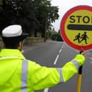 School crossing patrols could be put at risk as a result of measures by Hampshire County Council to save money. Picture for illustrative purposes only
