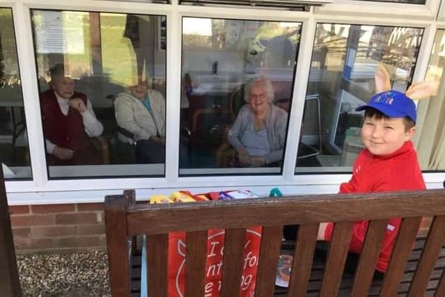 Albie with some of the residents at Alexandra Rose Care Home