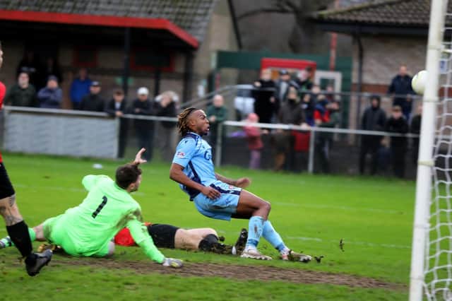 Rafa Ramos scores for Portchester in last January's Wessex League derby at Fareham Town which attracted a crowd of 621 to Cams Alders. Picture: Sam Stephenson