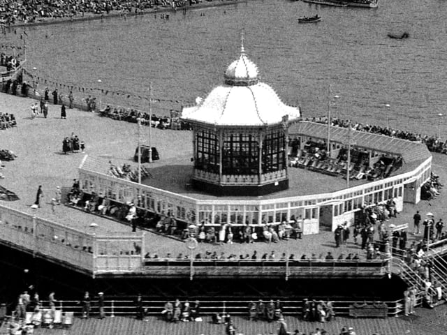 South Parade Pier, Southsea, with packed beaches in the background in the 1930's