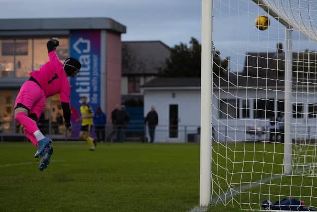 Nick Dembele's shot curls into the top corner for Gosport's winner against Beaconsfield. Picture: Colin Farmery.