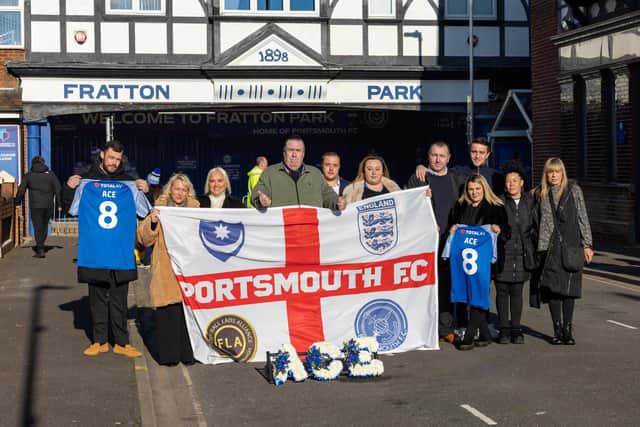 Family and friends of Ace Rewcastle gathered outside Fratton Park. Picture: Mike Cooter (210123)