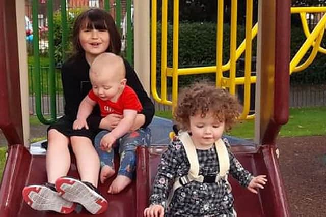 Mark Cummins' children, from left,  Ivymai, seven, one year old Rhys and Shannon, two Picture: Mark Cummins/PA Wire