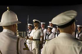 Pictured: HMS Albion Guard stands to attention. as distinguished guests were invited to a capability display on HMS Albion flight deck whilst alongside in Alexandra.