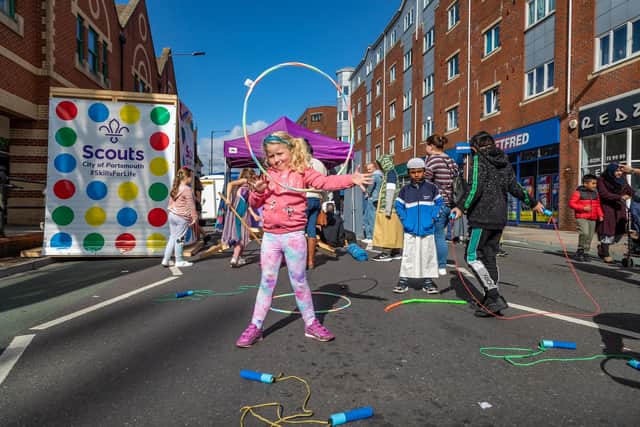 Ellie Hardman (6) learns to hula-hoop at the Feel Good Fratton event. Picture: Mike Cooter (021022)