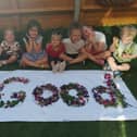 Children at Tops Nursery celebrate after their 'Good' Ofsted rating. 